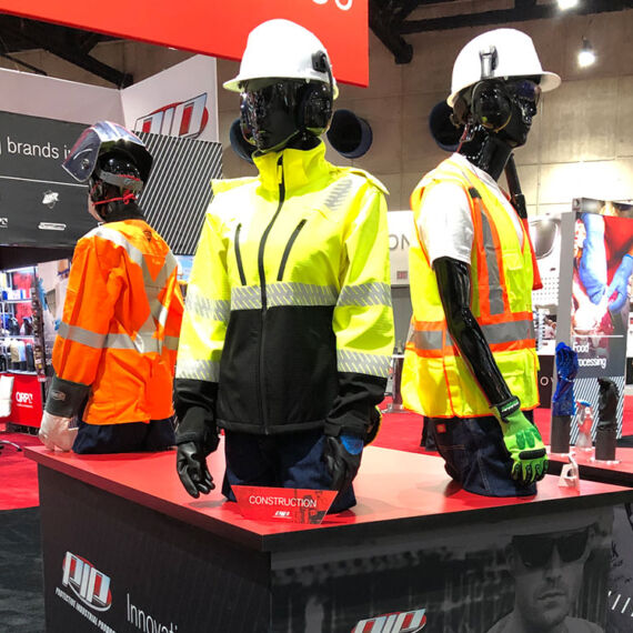 construction mannequins at convention booth