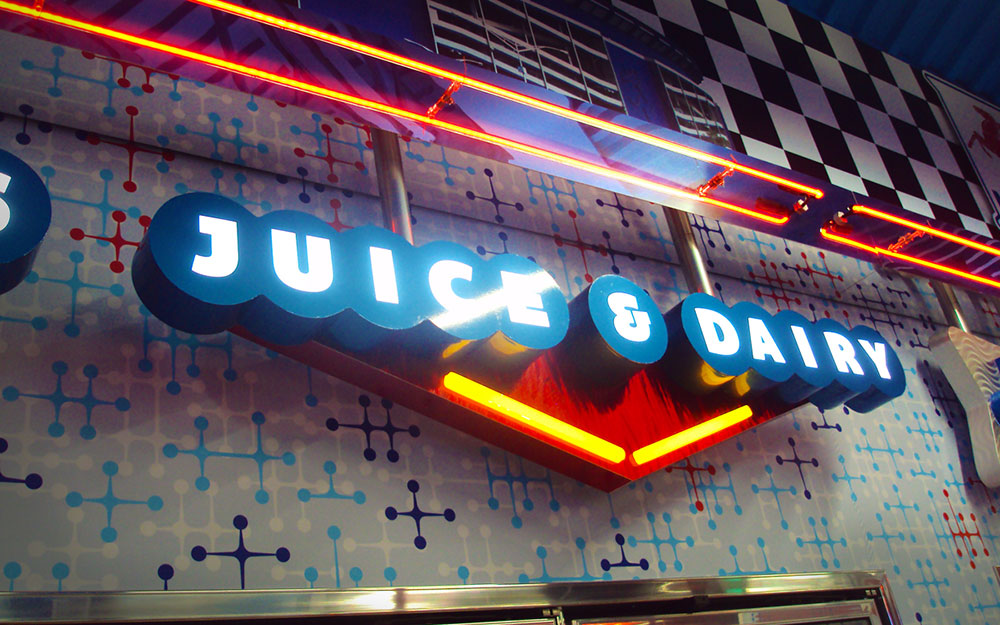 Juice and Dairy lighted sign with dimensional letters for a permanent store fixture at Flory's Deli