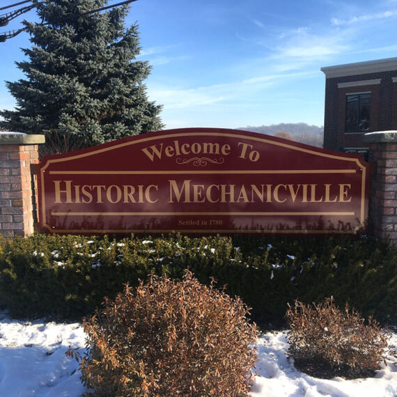 Exterior sign reading Welcome to Historic Mechanicville