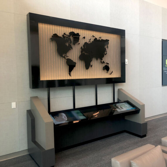 World map display made with black acrylic and welded copper wire